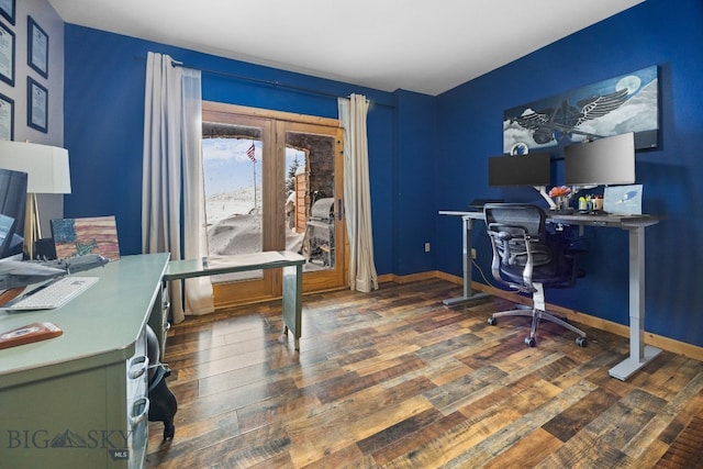 office area with baseboards and wood finished floors
