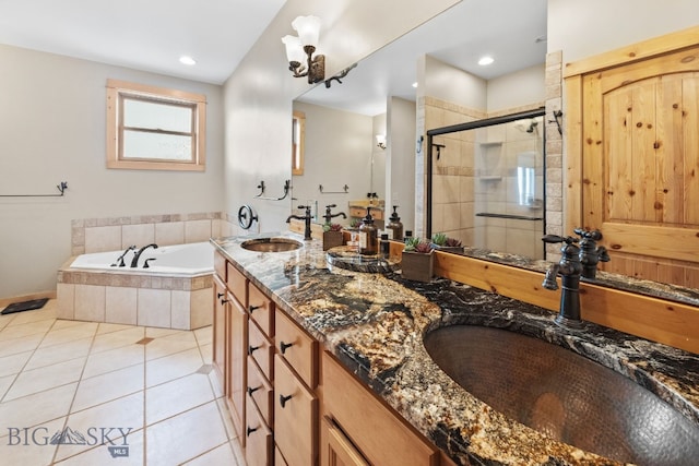 160 Hilltop Vis, Three Forks, MT 59752 - full bath featuring a garden tub, tile patterned flooring, double vanity, a stall shower, and recessed lighting