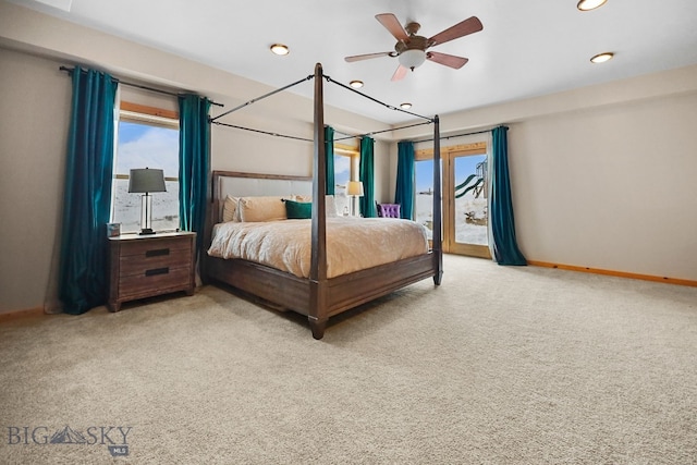 carpeted bedroom featuring recessed lighting, access to outside, and multiple windows