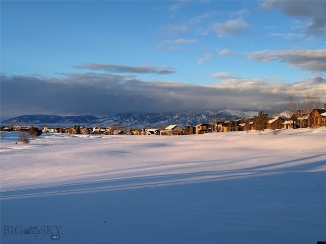 water view with a residential view and a mountain view