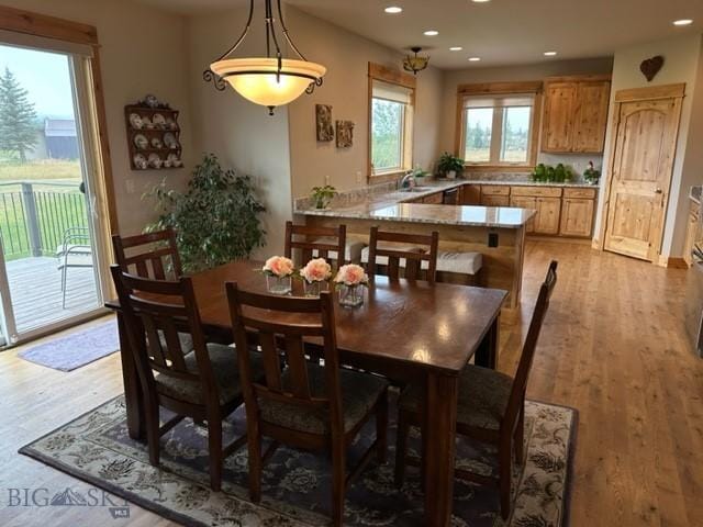 dining room featuring light wood-style floors and recessed lighting