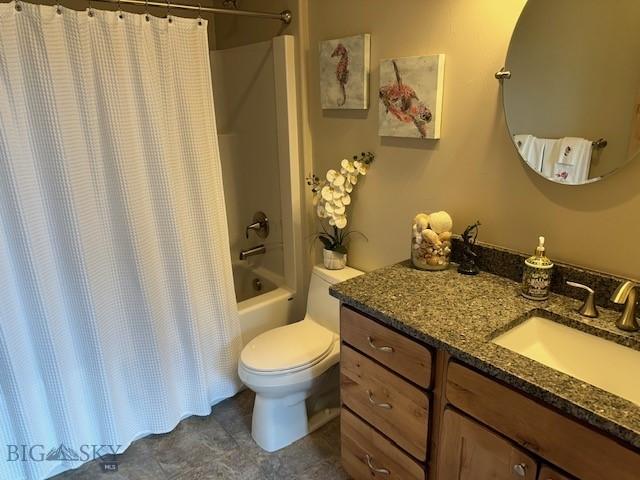 bathroom featuring toilet, shower / bathtub combination with curtain, and vanity