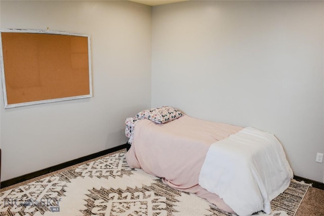 bedroom with baseboards