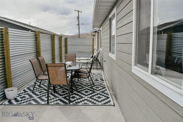 view of patio / terrace featuring outdoor dining area and a fenced backyard