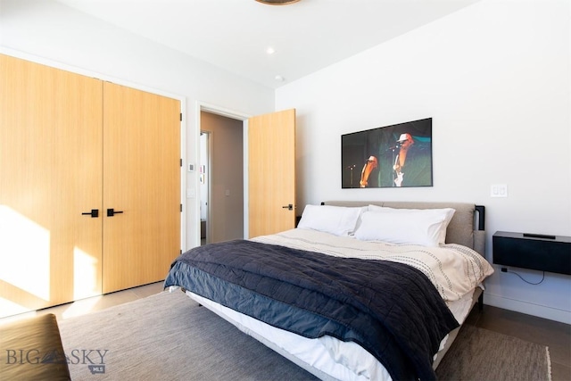 bedroom featuring a closet and recessed lighting