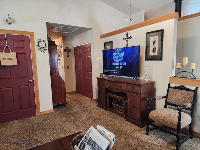 living area featuring high vaulted ceiling, baseboards, and carpet flooring