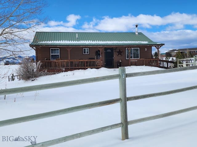 view of front of property with metal roof