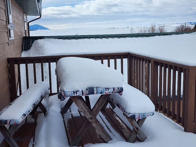 view of snow covered deck