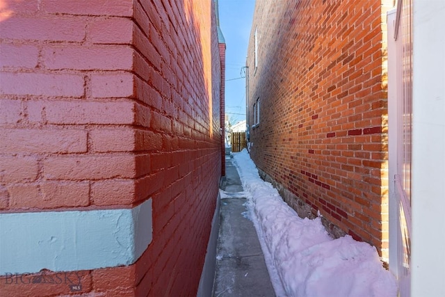 view of home's exterior featuring brick siding