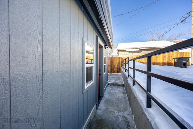 view of property exterior featuring fence