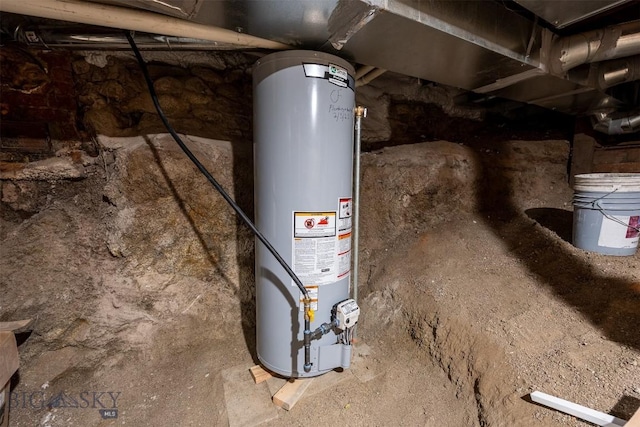 utility room featuring gas water heater