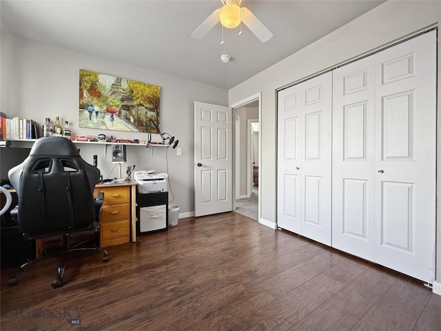 office with baseboards, dark wood finished floors, and a ceiling fan