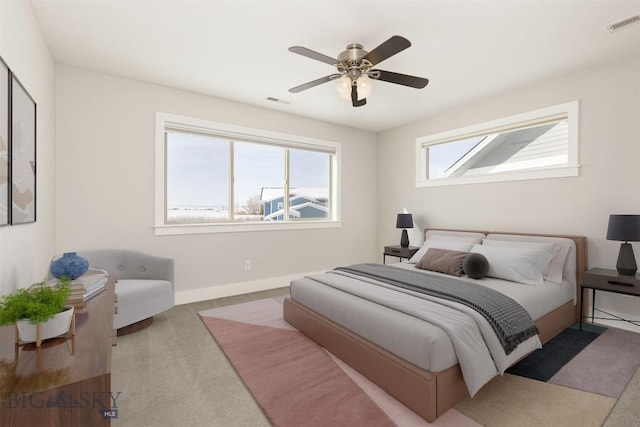 500 Westgate, Bozeman, MT 59718 - bedroom with carpet floors, baseboards, and a ceiling fan