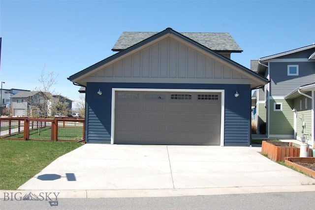 500 Westgate, Bozeman, MT 59718 - craftsman-style house with board and batten siding, roof with shingles, an outdoor structure, and a garage