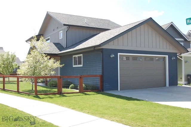 500 Westgate, Bozeman, MT 59718 - view of front of house featuring roof with shingles, driveway, board and batten siding, and a garage