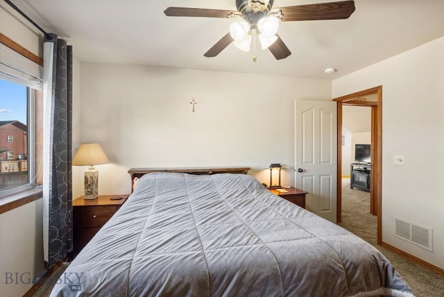 1014 Idaho St, Belgrade, MT 59714 - carpeted bedroom with a ceiling fan