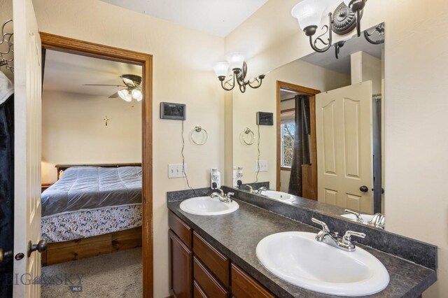 1014 Idaho St, Belgrade, MT 59714 - ensuite bathroom with double vanity and a ceiling fan
