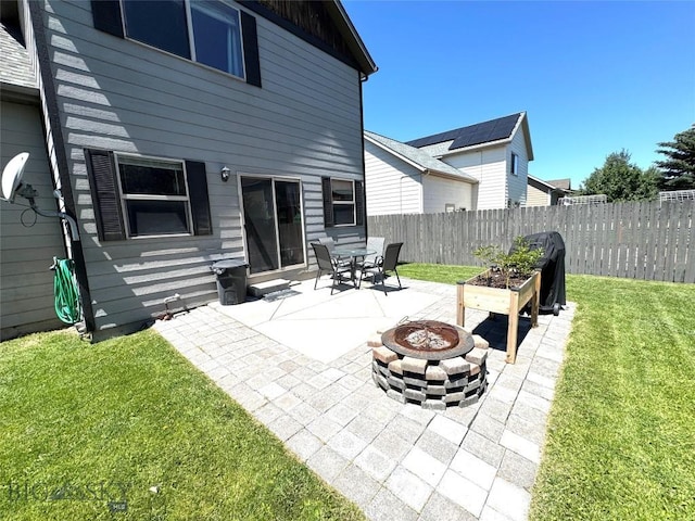 1014 Idaho St, Belgrade, MT 59714 - view of patio featuring a fire pit