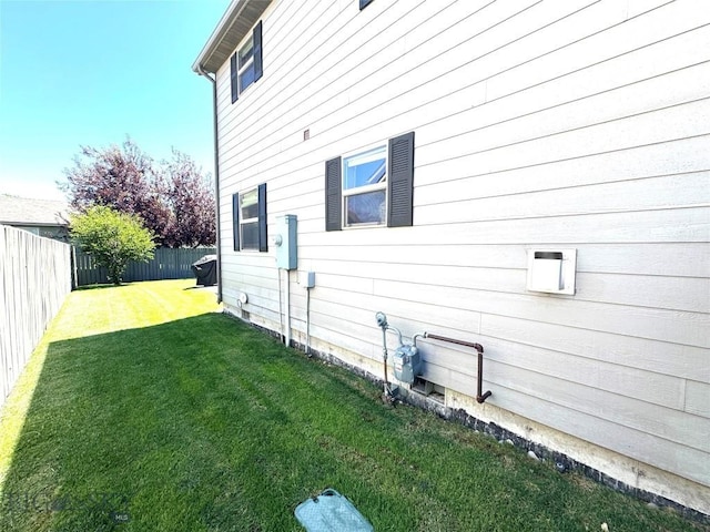 1014 Idaho St, Belgrade, MT 59714 - view of property exterior featuring a fenced backyard