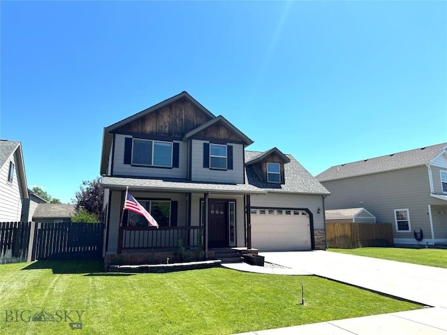 1014 Idaho St, Belgrade, MT 59714 - view of front facade featuring a porch, driveway, an attached garage, board and batten siding, and a shingled roof