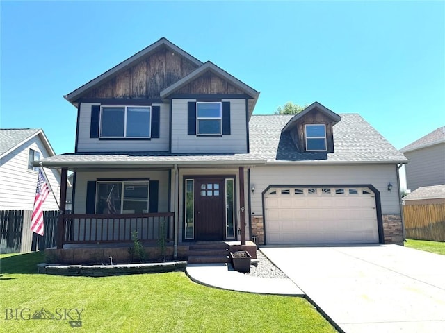 1014 Idaho St, Belgrade, MT 59714 - view of front of home featuring a garage, a porch, concrete driveway, and a shingled roof