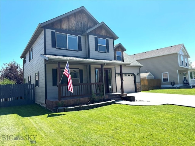 1014 Idaho St, Belgrade, MT 59714 - view of front of property featuring covered porch, concrete driveway, a garage, and board and batten siding