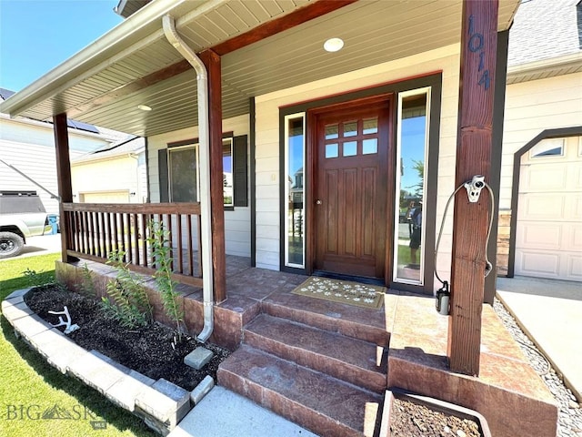 1014 Idaho St, Belgrade, MT 59714 - entrance to property with covered porch and a garage