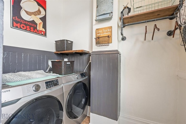 laundry area with laundry area and independent washer and dryer