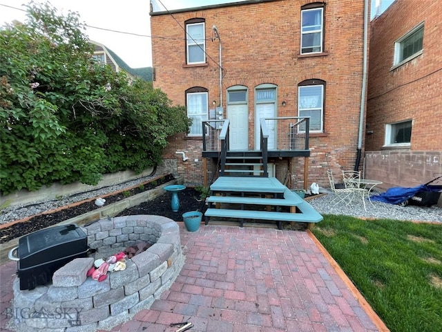 exterior space with brick siding