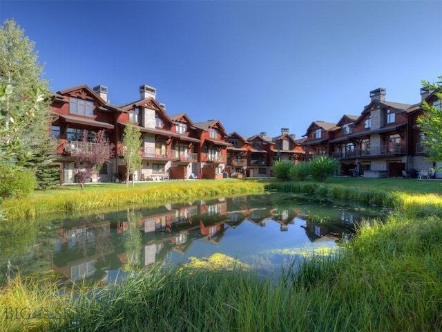 exterior space with a water view