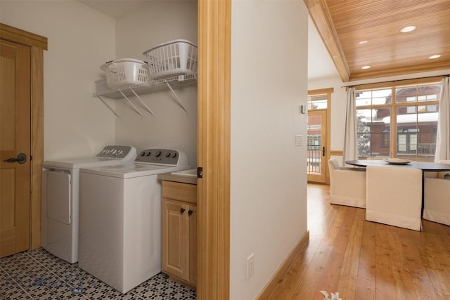 laundry area with recessed lighting, cabinet space, wood ceiling, light wood-type flooring, and independent washer and dryer