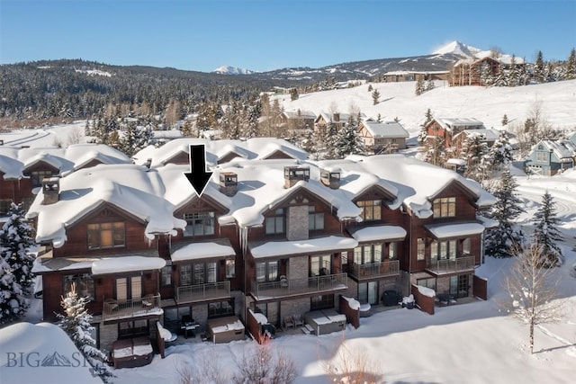 exterior space featuring a residential view and a mountain view