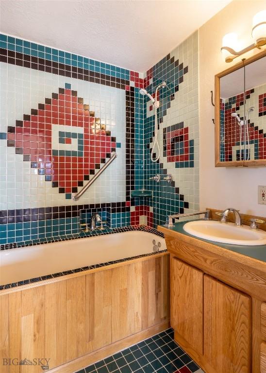 full bath featuring tile patterned flooring and vanity