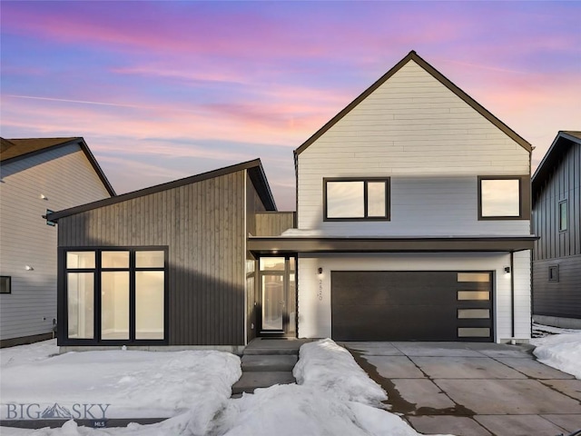 contemporary house with a garage and driveway