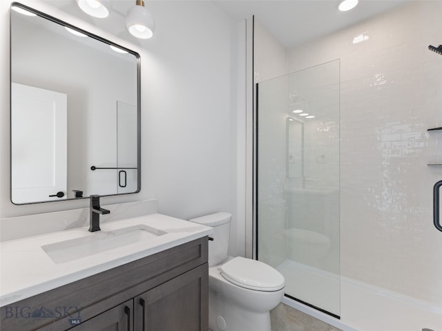 2820 S 30th Ave, Bozeman, MT 59718 - full bathroom featuring toilet, a stall shower, and vanity