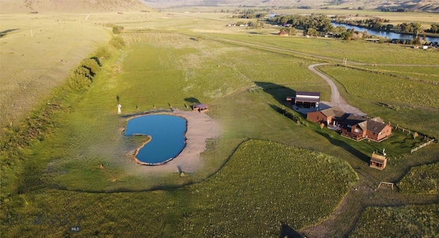 bird's eye view with a rural view and a water view