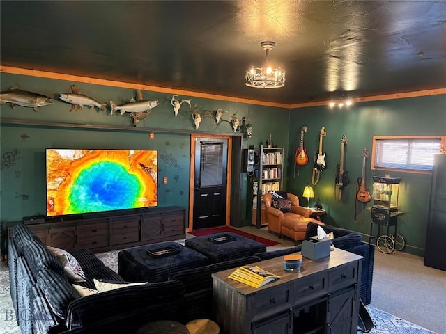 home theater room with a chandelier and carpet flooring