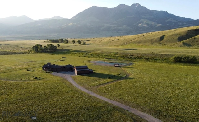 view of mountain backdrop featuring rural landscape