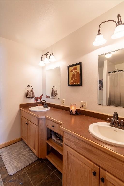 bathroom featuring vanity and tile patterned floors