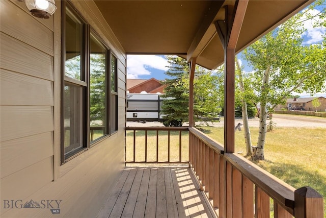 727 Mirza Way, Ennis, MT 59729 - wooden deck with a lawn