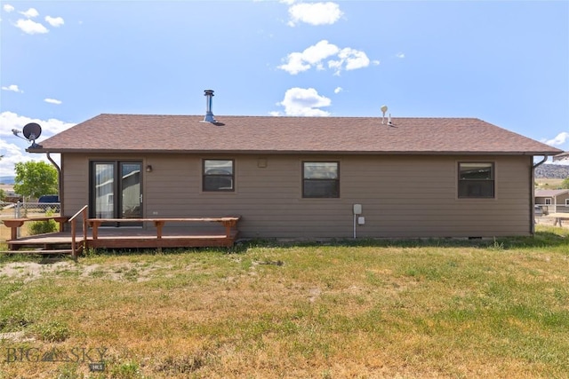 727 Mirza Way, Ennis, MT 59729 - back of property featuring a deck and a lawn