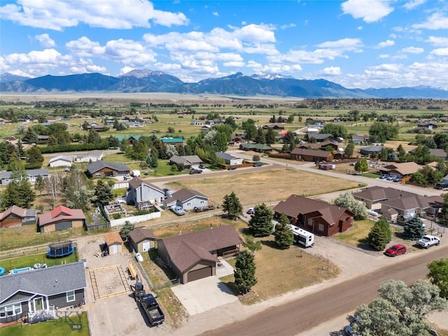 727 Mirza Way, Ennis, MT 59729 - aerial view of residential area with a mountainous background