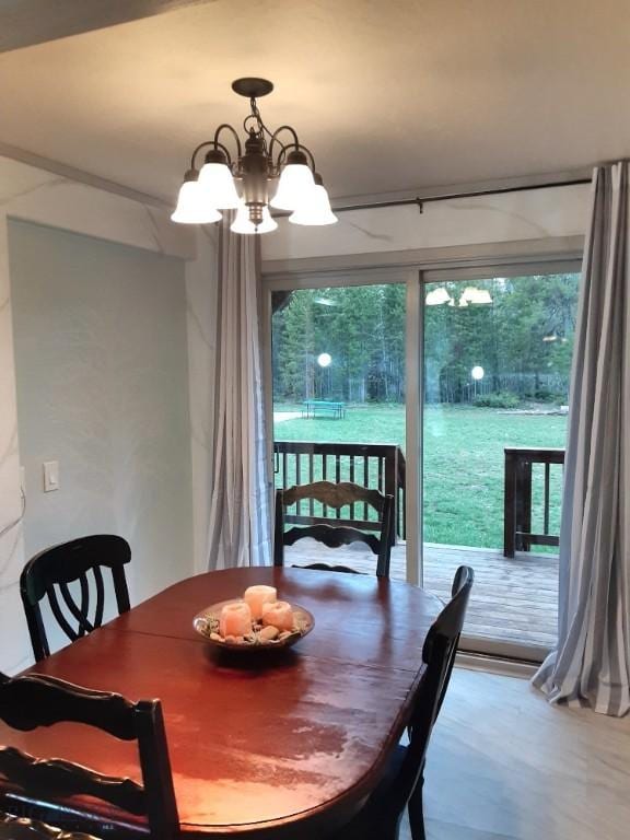 dining room featuring a notable chandelier