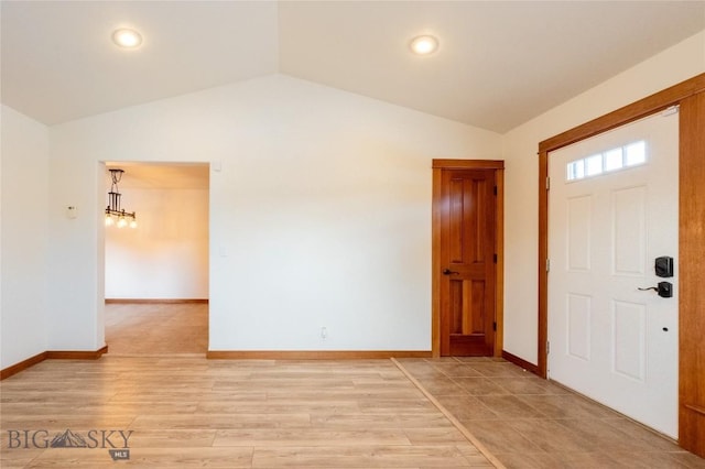 2212 Sourdough Rd, Bozeman, MT 59715 - foyer entrance featuring vaulted ceiling, baseboards, recessed lighting, and light wood finished floors