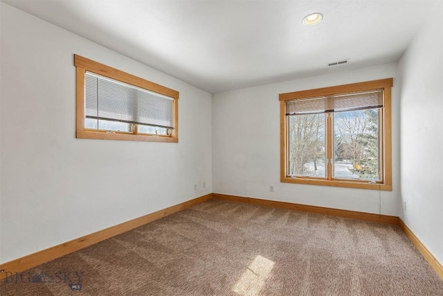 1281 Stoneridge Unit A, Bozeman, MT 59718 - carpeted spare room featuring baseboards