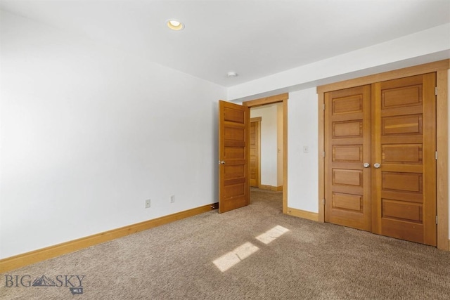 1281 Stoneridge Unit A, Bozeman, MT 59718 - unfurnished bedroom featuring carpet, a closet, and recessed lighting