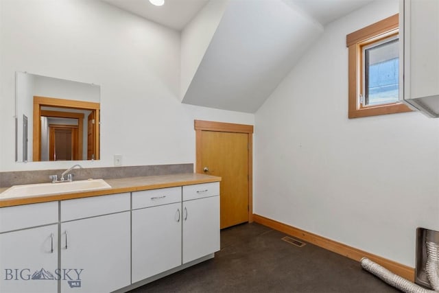 1281 Stoneridge Unit A, Bozeman, MT 59718 - bathroom featuring vanity and lofted ceiling