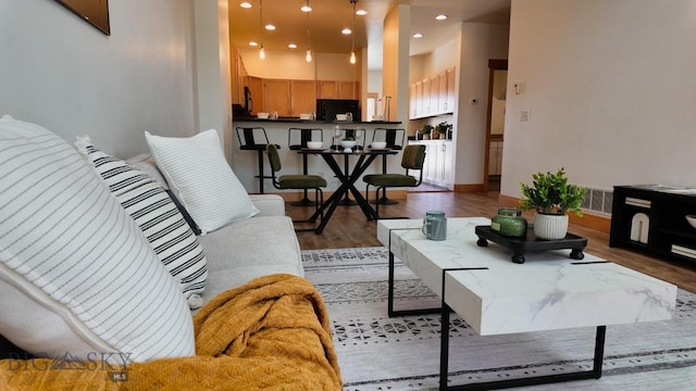 1281 Stoneridge Unit A, Bozeman, MT 59718 - living room featuring wood finished floors and recessed lighting