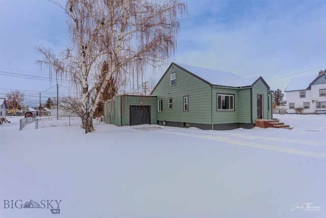700 4th, Deer Lodge, MT 59722 - view of front of property featuring a garage and an outdoor structure