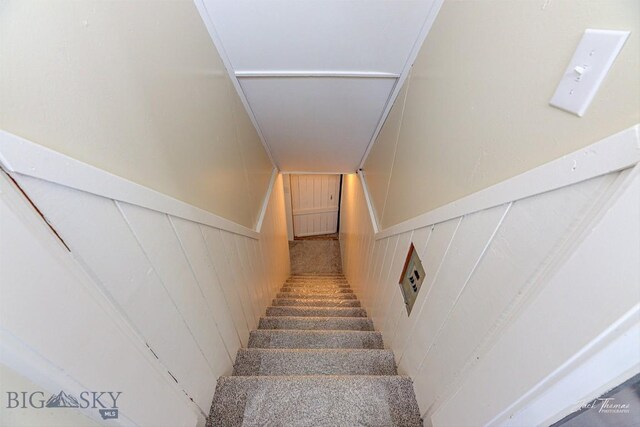700 4th, Deer Lodge, MT 59722 - stairs with wainscoting and wooden walls